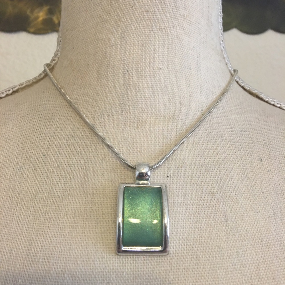 Metallic green resin pendant on snake chain
